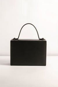 Box Bag leather, Tann-ed, crafted in genuine leather with a top handle and side and crossbody sling