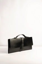 Load image into Gallery viewer, Capsule Bag Clutch in Black pure leather Tanned
